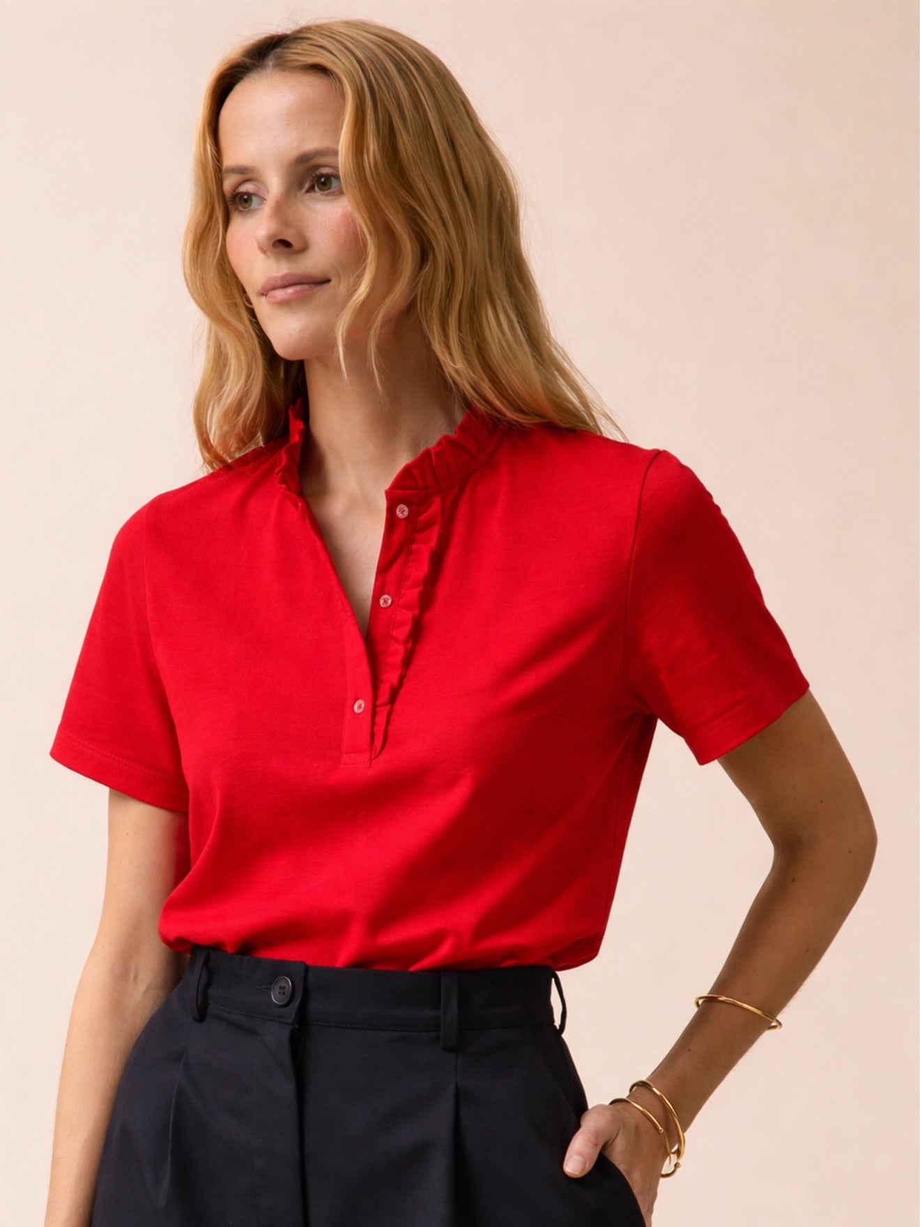 Polo maille piquée col volanté femme