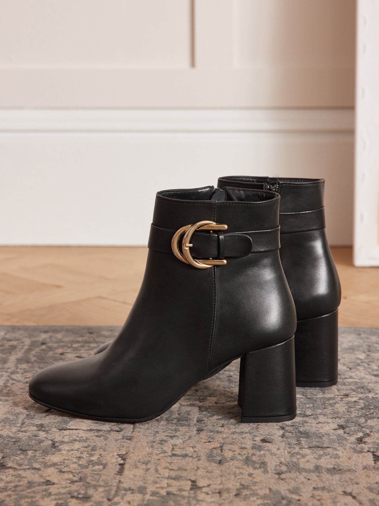 Boots à boucle et talon cuir femme