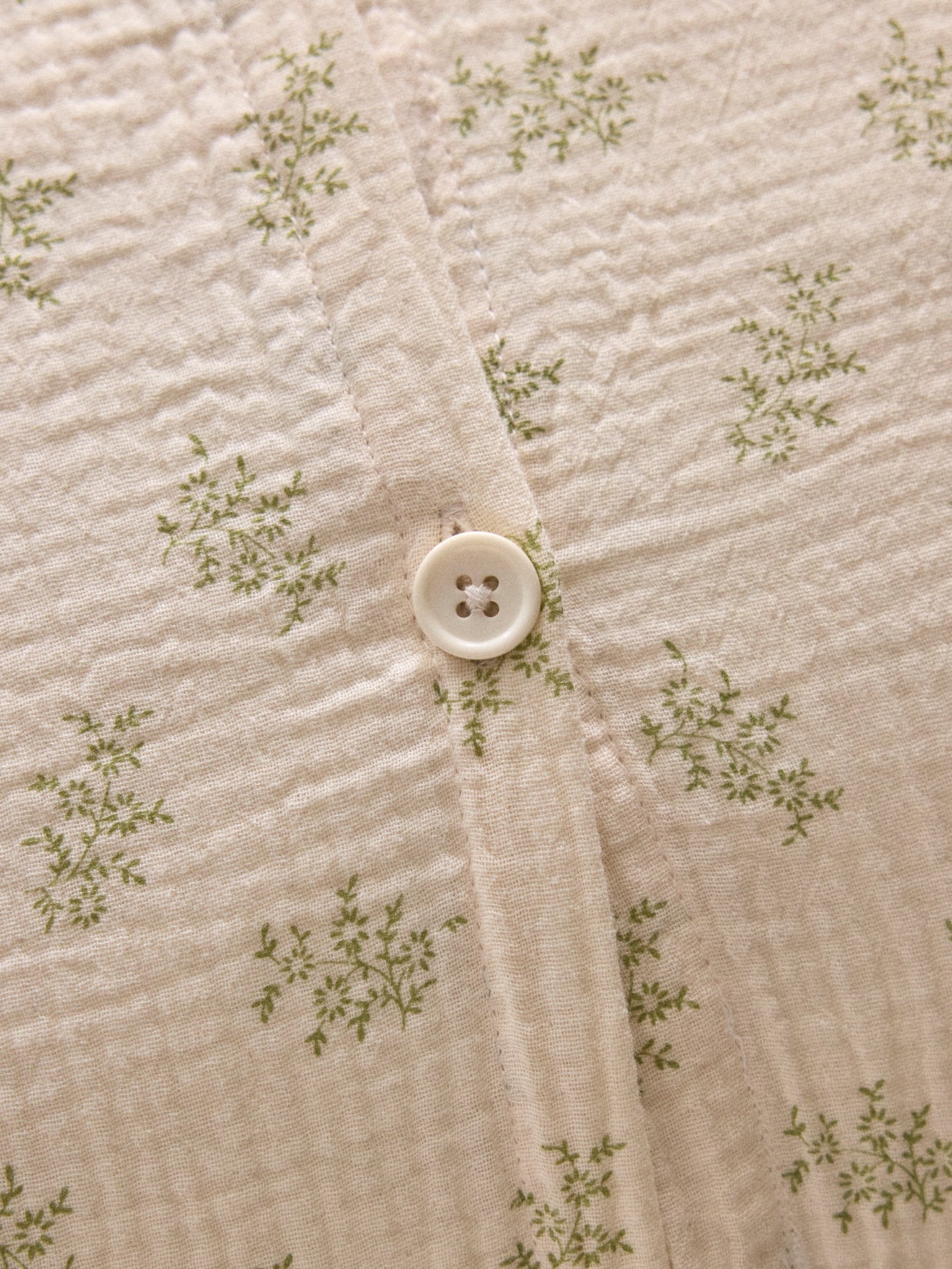 Coussin volanté en gaze de coton