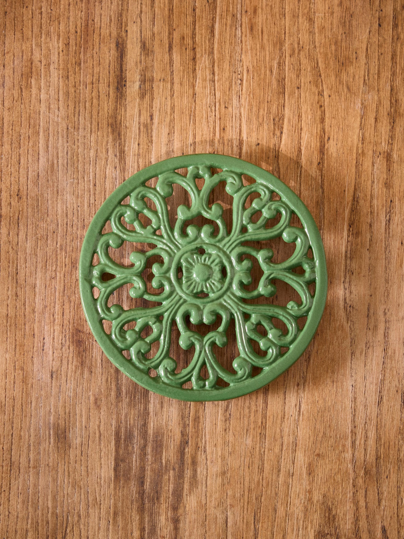 Dessous de plat rond en fonte