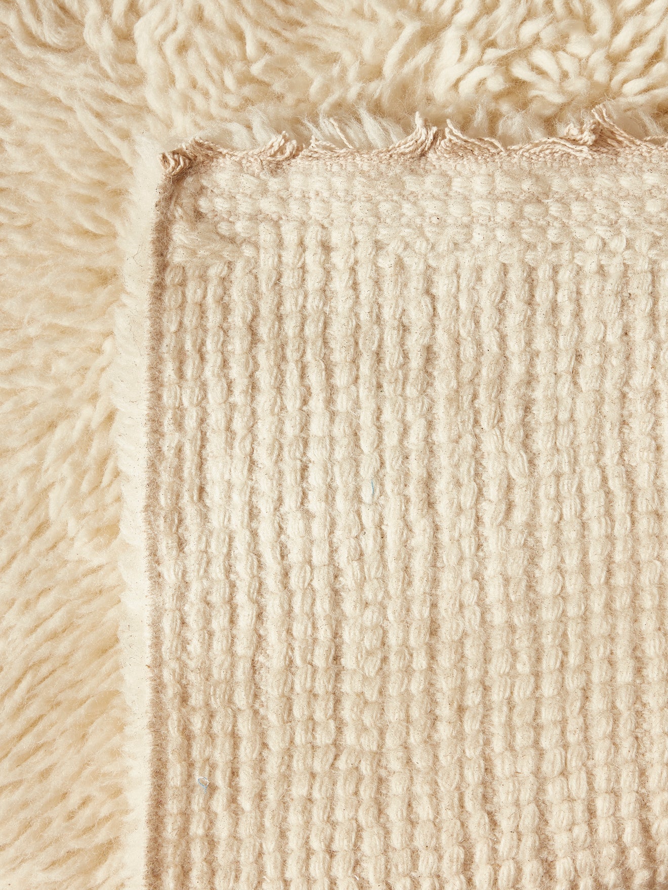 Petit tapis poils longs pure laine